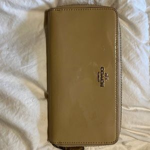 Tan coach zip wallet